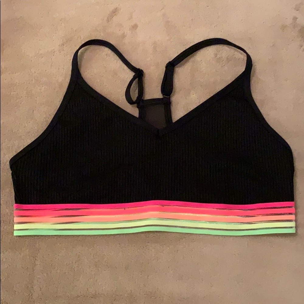 Pink sports bra in the color black